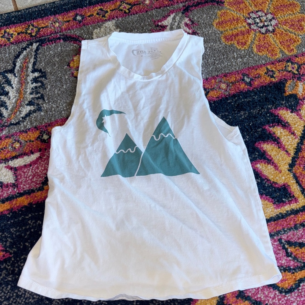 White Sleeveless Top with Teal Graphic